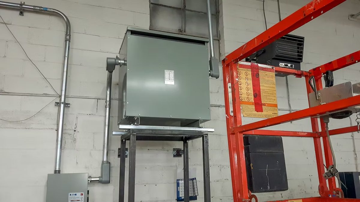 Professionally installed electrical transformer on a steel stand